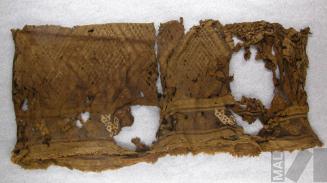 Unku con diseños romboidales y de felinos