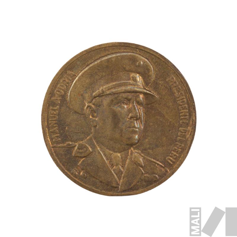 Moneda conmemorativa por la inauguración del Ministerio de Educación Pública