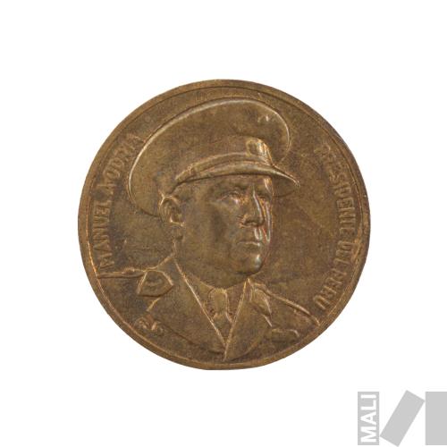 Moneda conmemorativa por la inauguración del Ministerio de Educación Pública