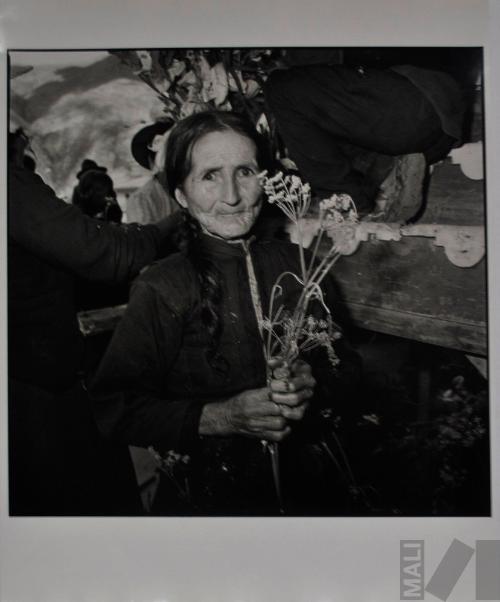 Woman Outside the Church at Easter
